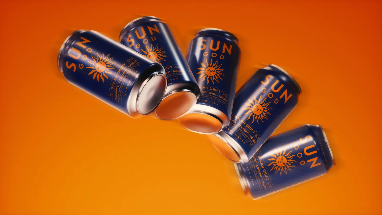 Solar Drift cans tumbling across a bright orange background